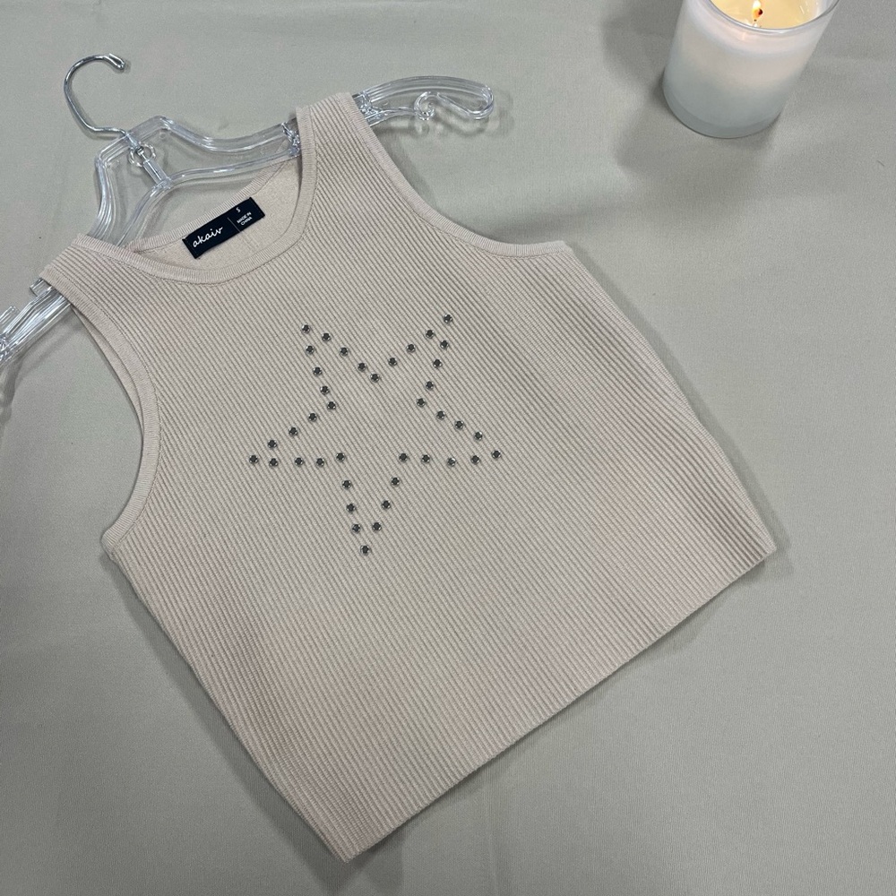 Trendy Beige Ribbed Tank Top with Star Pattern